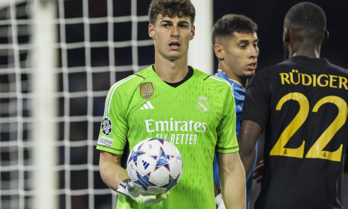 Real Madrid s Spanish goalkeeper Kepa Arrizabalaga controls the ball during the Uefa champions league match between SSC