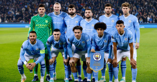 Manchester City goalkeeper Ederson, Erling Haaland, Josko Gvardiol, Mateo Kovacic, Ruben Dias, John Stones, Kyle Walker, Phil Foden, Jack Grealish, Rico Lewis and Matheus Nunes pose for a team photo on the pitch ahead of the UEFA Champions League Group G