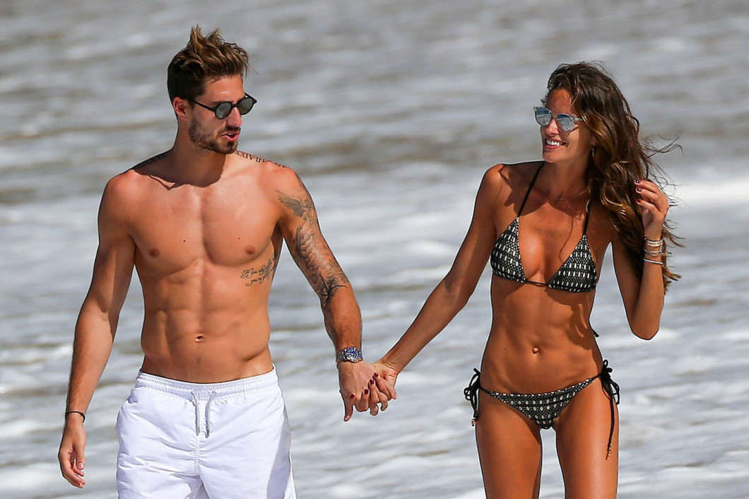 EXCLUSIVE: Kevin Trapp and girlfriend Izabel Goulart taking a swim on the beach in Saint Barths
