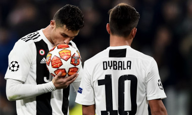 Cristiano Ronaldo (L) of Juventus FC kisses the ball during