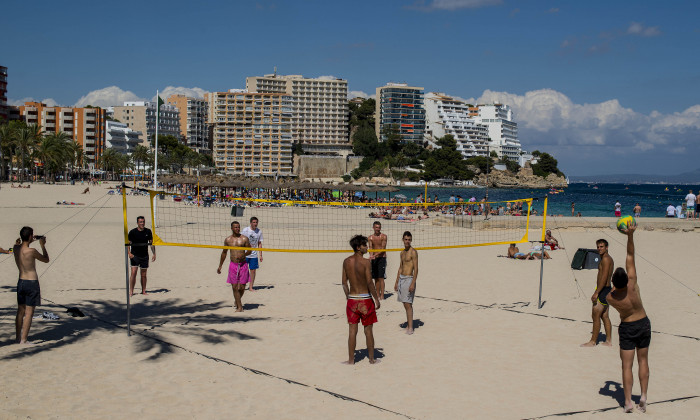 Tourists Flock To The Mallorcan Town Of Magaluf