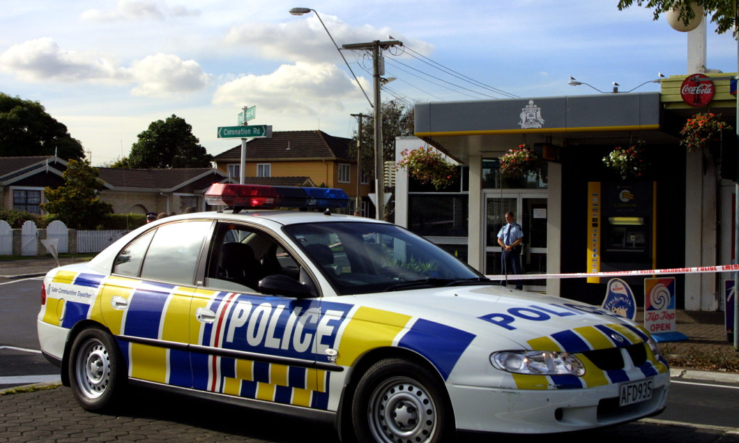 A policeman guards the outside of the ASB bank, th