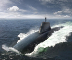 Raport: Un submarin nuclear britanic a evitat la limită o coliziune cu un feribot. Este al treilea incident în patru ani
