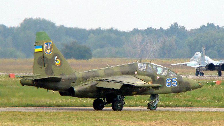 Ukrainian Air Force Su-25UB with two MiG-29s 9-13 in background