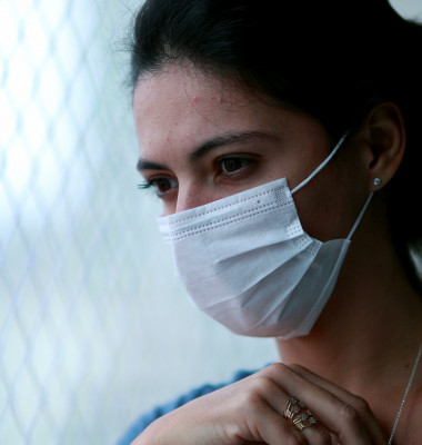 Woman,Staying,At,Home,Wearing,Covid,Pandemic,Mask,,Girl,Looking
