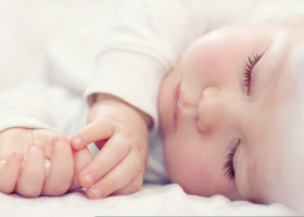 Close-up,Portrait,Of,A,Beautiful,Sleeping,Baby,On,White