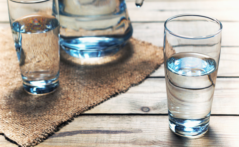 Glasses,Of,Water,On,A,Wooden,Table.,Selective,Focus.,Shallow