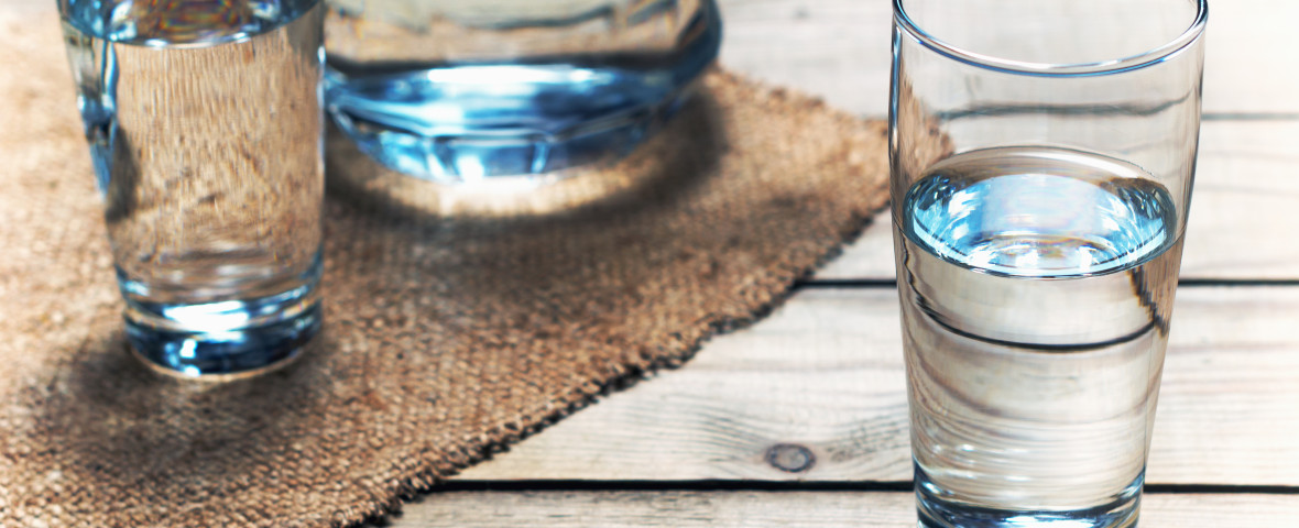 Glasses,Of,Water,On,A,Wooden,Table.,Selective,Focus.,Shallow