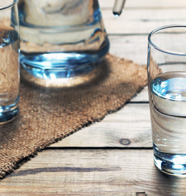 Glasses,Of,Water,On,A,Wooden,Table.,Selective,Focus.,Shallow