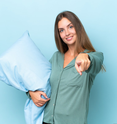 Young,Beautiful,Woman,Isolated,On,Blue,Background,In,Pajamas,And
