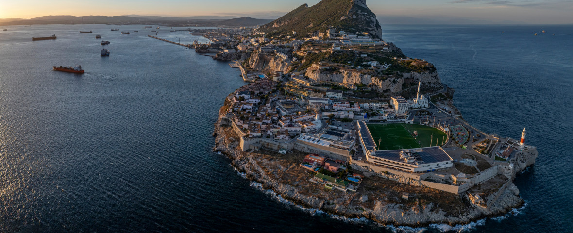 Gibraltar,On,The,Beach,,Aerial,Panorama,View,,Summer,At,Sunset