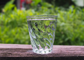 Fresh,Glass,Of,Drinking,Water,On,Wooden,Table,On,Blurred