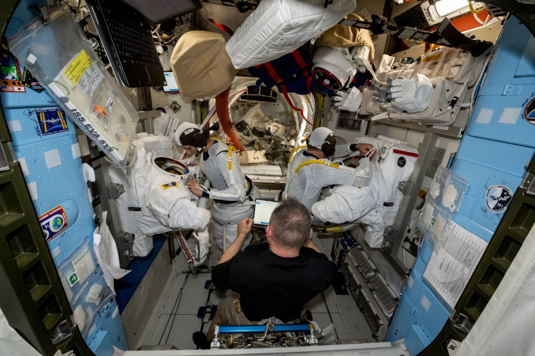 Astronauts practice suiting up in prep for spacewalk