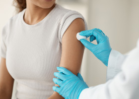 Hands,,Doctor,And,Patient,With,Cotton,At,Clinic,For,Vaccine