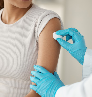 Hands,,Doctor,And,Patient,With,Cotton,At,Clinic,For,Vaccine
