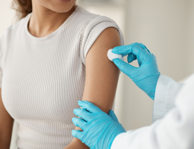 Hands,,Doctor,And,Patient,With,Cotton,At,Clinic,For,Vaccine