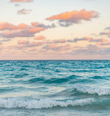 Sea horizon view. Cloudy sky and seascape at summer vacation. Skyscape with sea horizon. Calm horizon view at sea sunrise. Romantic summer vacation