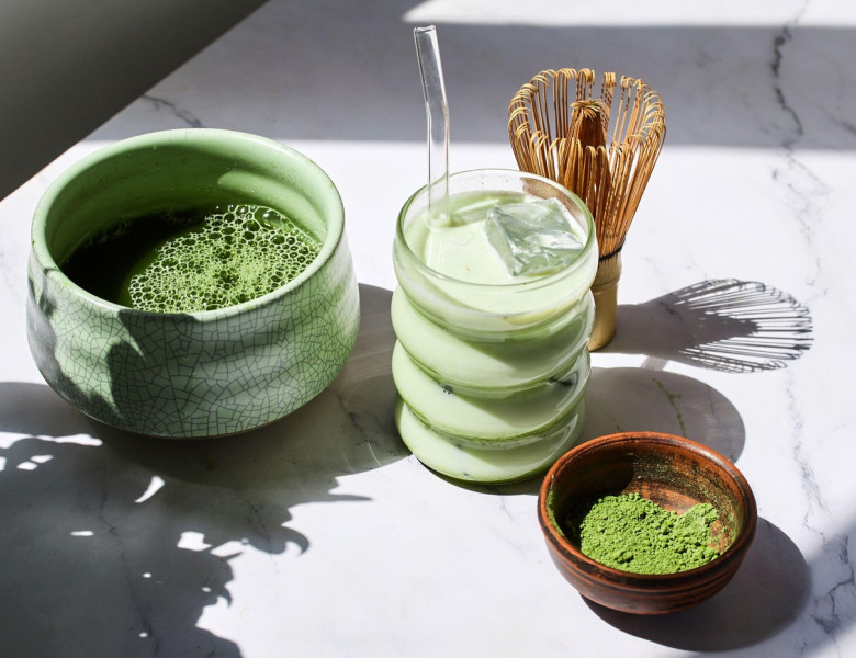 Iced Matcha Refreshment. Refreshing iced matcha drinks with a bamboo whisk and matcha powder