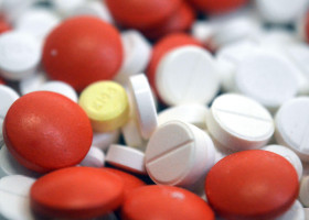 Cairo, Egypt, October 11 2025: A closeup of a Pile of tablets, medical treatment with drugs concept, misuse and drug abuse concept, background of stac