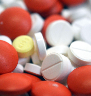 Cairo, Egypt, October 11 2025: A closeup of a Pile of tablets, medical treatment with drugs concept, misuse and drug abuse concept, background of stac
