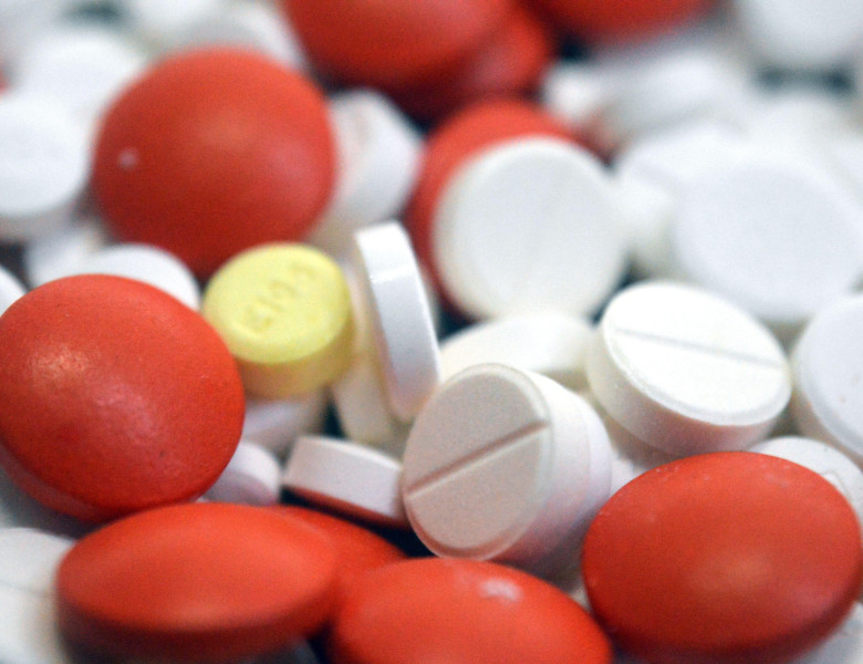 Cairo, Egypt, October 11 2025: A closeup of a Pile of tablets, medical treatment with drugs concept, misuse and drug abuse concept, background of stac
