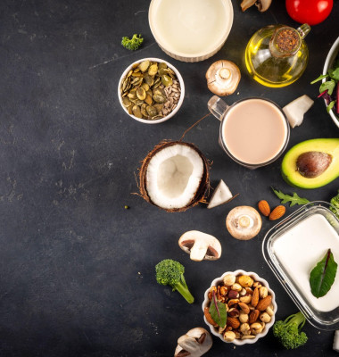 Plant based keto food background with, low carb vegan keto diet ingredients, healthy vegetarian fat and protein source. Assortment green vegetables, n