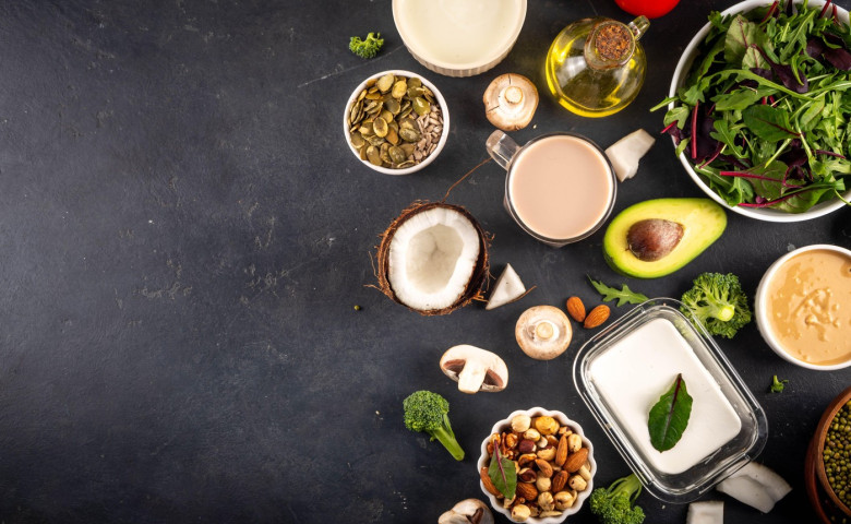 Plant based keto food background with, low carb vegan keto diet ingredients, healthy vegetarian fat and protein source. Assortment green vegetables, n