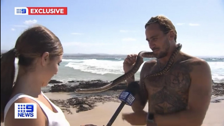Ce a pățit un bărbat din Australia după ce a făcut surf cu un șarpe/ Foto: Captură video Youtube
