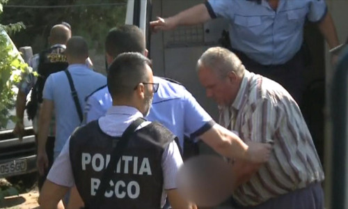 Gheorghe Dincă, luat de polițiști cu duba