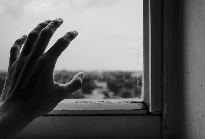 close-up-photography-of-hand-near-window-1264438