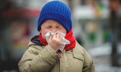 Little,Child,Boy,In,Scarf,And,Hat,Blow,His,Nose.