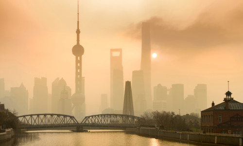 Shanghai,Financial,Center,And,Modern,Skyscraper,City,In,Misty,Gold