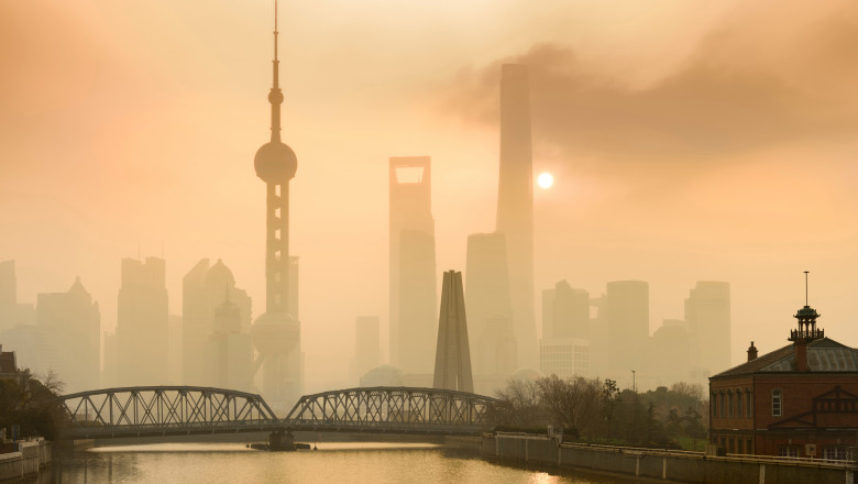 Shanghai,Financial,Center,And,Modern,Skyscraper,City,In,Misty,Gold