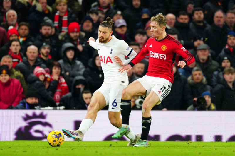 Radu Dragusin of Tottenham Hotspur and Rasmus Hojlund of Manchester United Manchester United v Tottenham Hotspur, Premier League, Football, Old Trafford, Manchester, UK - 14 Jan 2024,Image: 837005956, License: Rights-managed, Restrictions: EDITORIAL USE ONLY No use with unauthorised audio, video, data, fixture lists, club/league logos or 