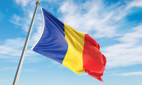 3d,Rendering,Romania,Flag,Waving,In,The,Wind,On,Flagpole.