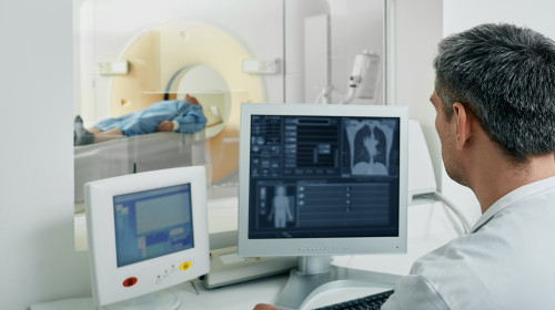 Doctor,Radiologist,Running,Ct,Scan,For,Patient's,Body,Lungs,From