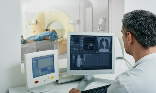 Doctor,Radiologist,Running,Ct,Scan,For,Patient's,Body,Lungs,From