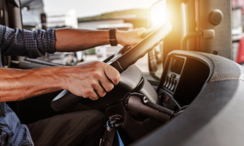 Cdl,Commercial,Driver,Inside,Of,His,Truck.,Transportation,Industry,Theme.