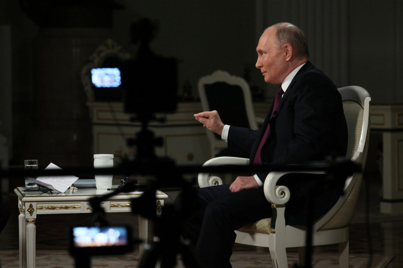 8615132 06.02.2024 Russian President Vladimir Putin speaks during an interview with US journalist Tucker Carlson at the Kremlin in Moscow, Russia. / POOL,Image: 844864852, License: Rights-managed, Restrictions: Editors' note: THIS IMAGE IS PROVIDED BY RUSSIAN STATE-OWNED AGENCY SPUTNIK., Model Release: no