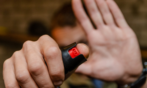 Man,Holding,Pepper,Spray,For,Self,Defense,Close,Up