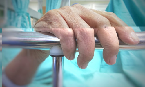 The,Old,Patient,Man,Hand,Is,Holding,Guard,Rails,Of