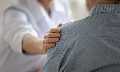 Close,Up,Caring,Doctor,Touching,Mature,Patient,Shoulder,,Expressing,Empathy