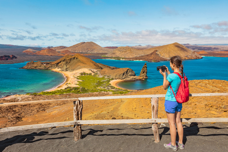 Galapagos,Islands,Tourist,Hiking,Taking,Photo,On,Bartolome,Island,Hike.