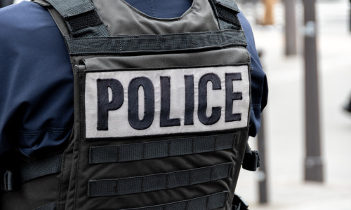 Close-up,'police',Marking,Written,On,The,Back,Of,A,Bulletproof