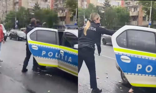 Momentul când o polițistă din Cluj îi dă cu spray lacrimogen în față colegului său/ Foto: Captură video Youtube