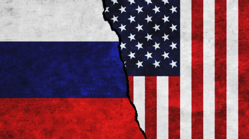 Usa,And,Russia,Painted,Flags,On,A,Wall,With,A