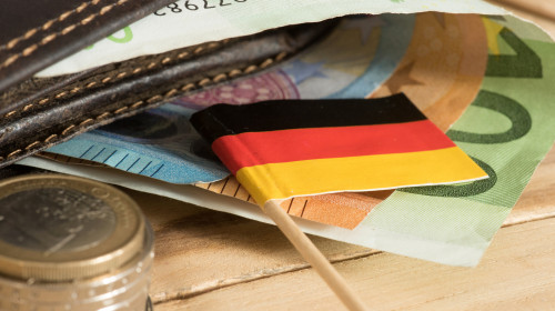 A,Wallet,,Flag,Of,Germany,And,Euro,Bills,And,Coins