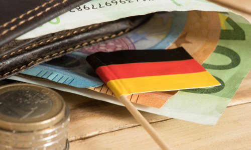 A,Wallet,,Flag,Of,Germany,And,Euro,Bills,And,Coins