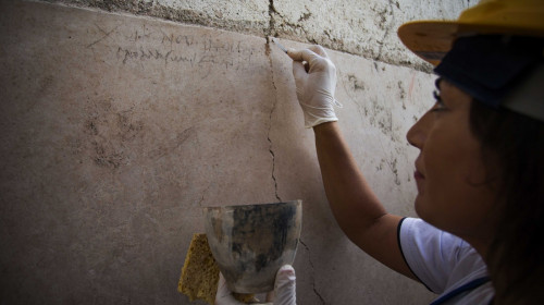 Italy, the ancient Roman city of Pompeii: Archeologists discover a new graffiti that could put an end to scholars' debate about the exact historical date of the eruption of Mt. Vesuvius that destroyed the city in 79 AD
