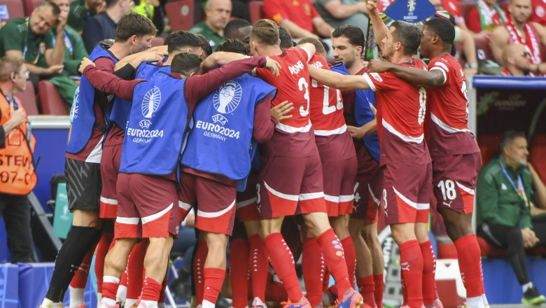 COLOGNE, GERMANY - JUNE 15: Switzerland squad celebrates Michel Aebischer of Switzerland (not showed) for his goal durin